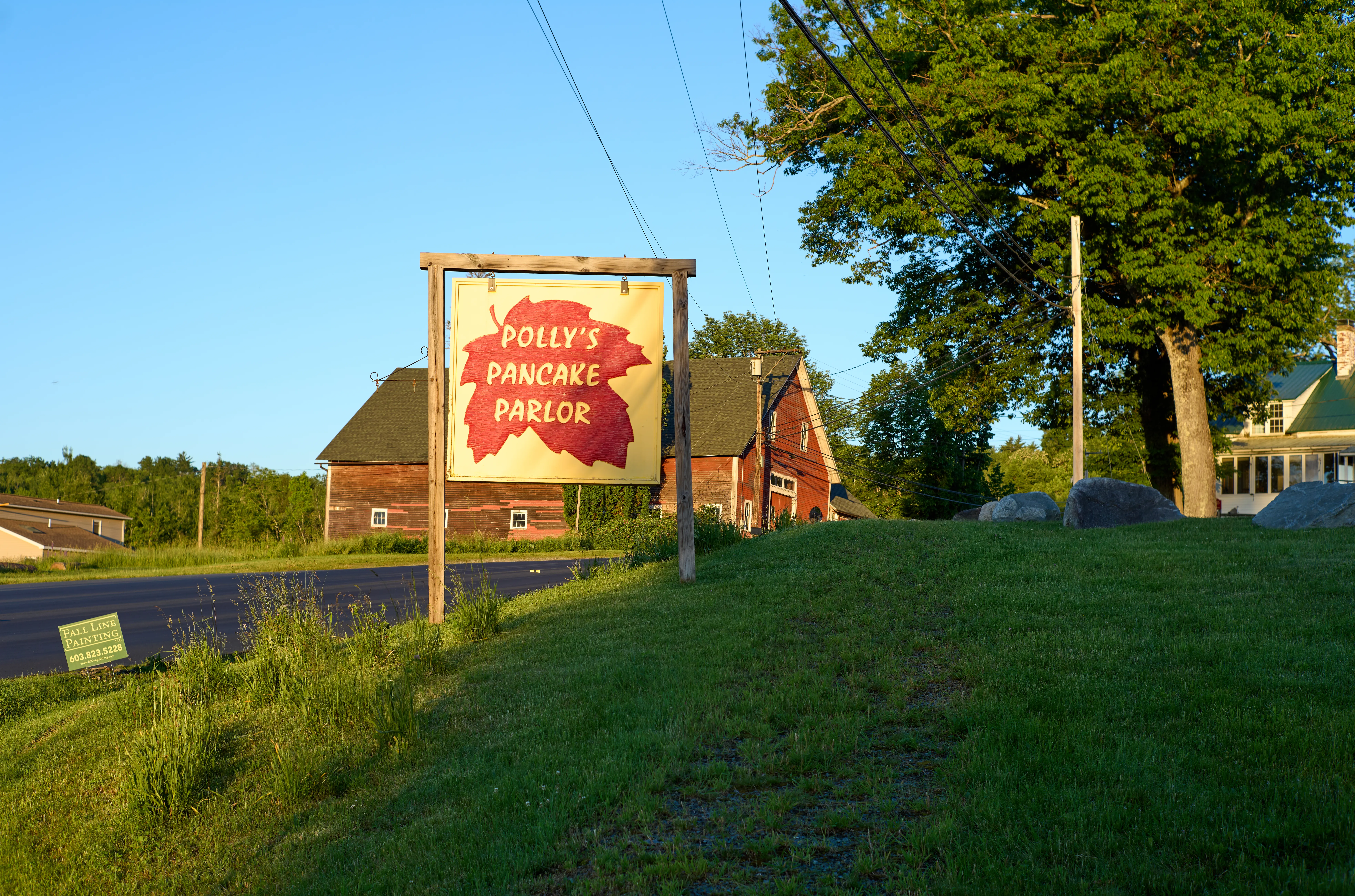 Polly's Pancake Parlor sign in warm morning light